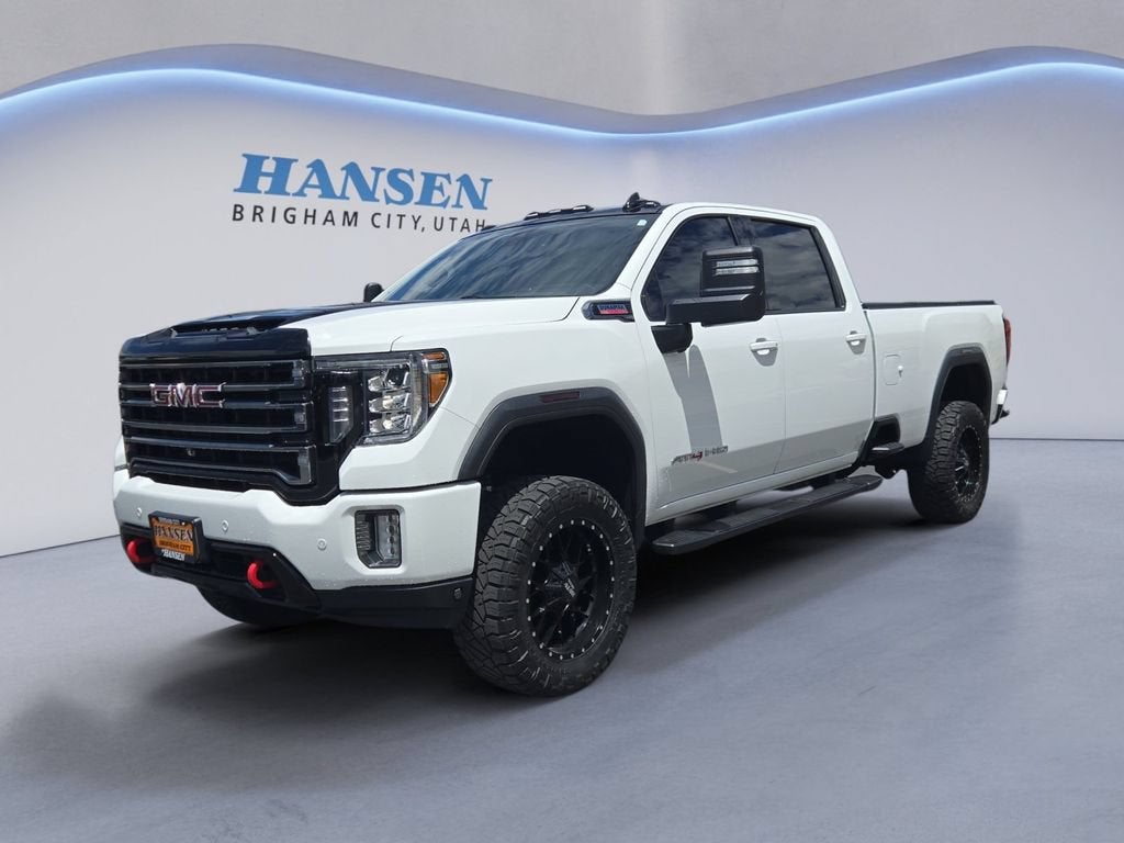 2020 GMC Sierra 3500 HD AT4 in Summit White — front three-quarter view