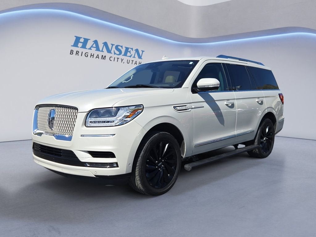 2020 Lincoln Navigator Reserve in Gold — front three-quarter view